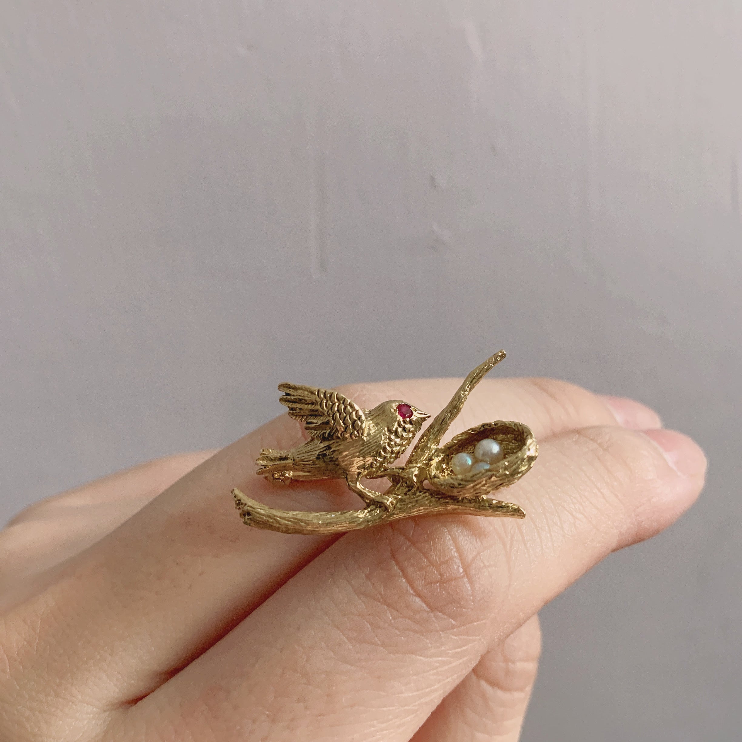 18K yellow gold bird and nest pin with pearls