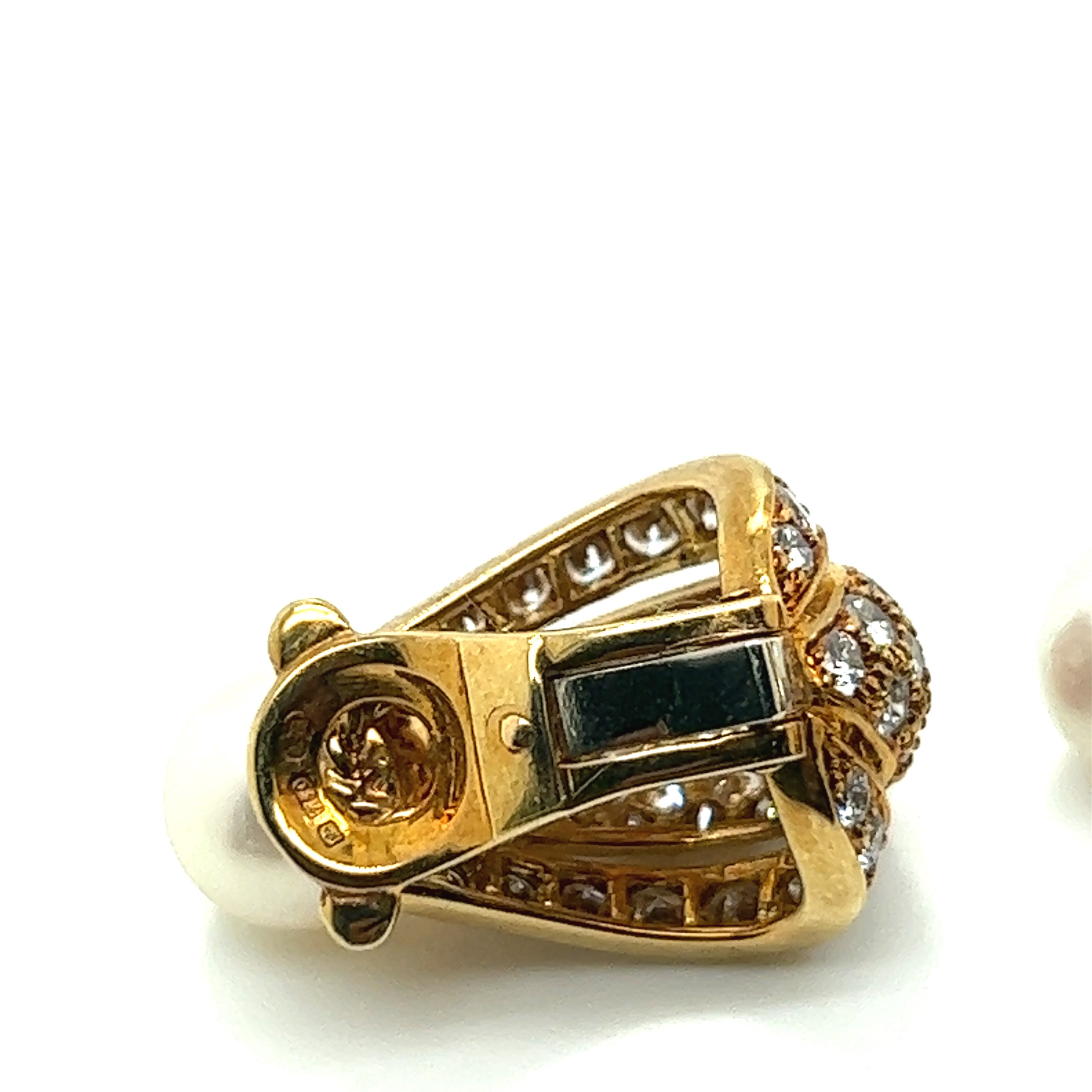 Cartier, a pair of diamond and cultured pearl ear clips