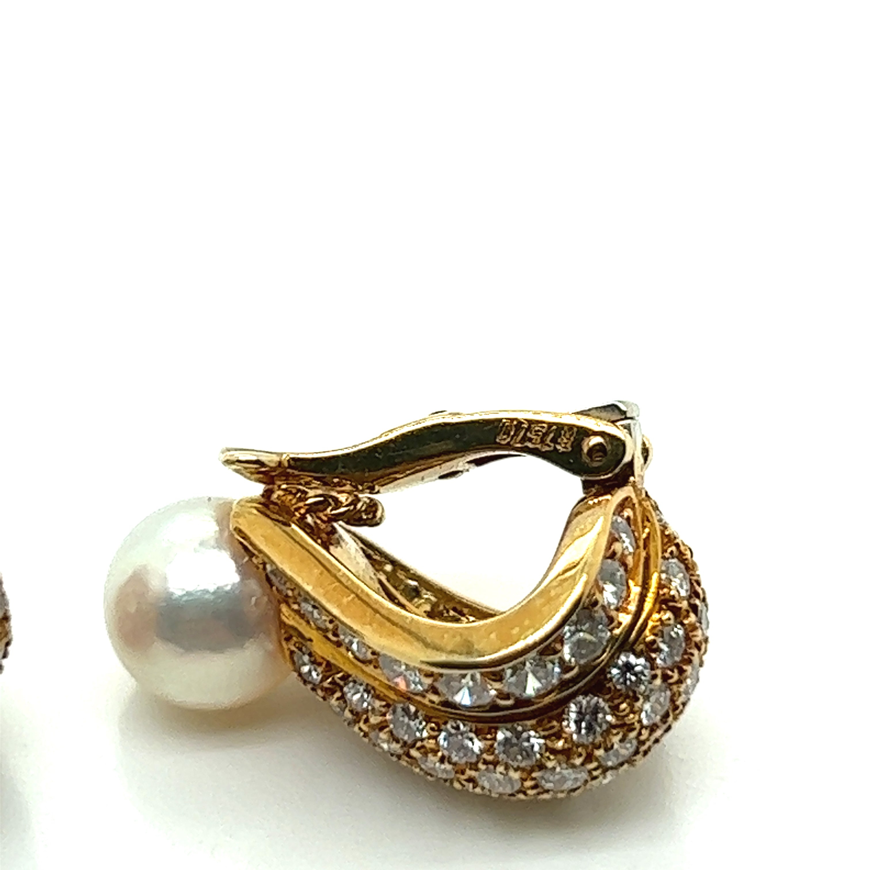 Cartier, a pair of diamond and cultured pearl ear clips