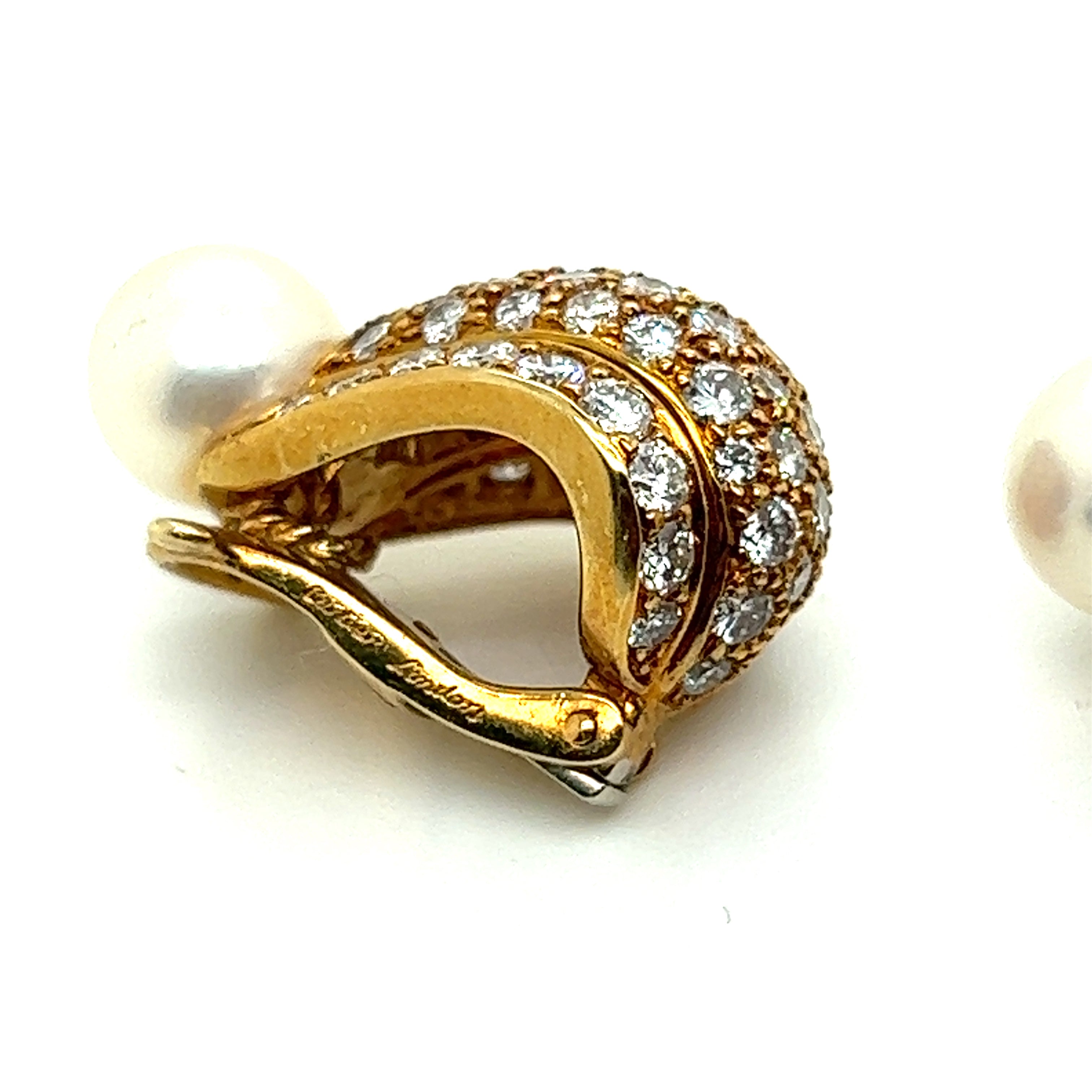 Cartier, a pair of diamond and cultured pearl ear clips