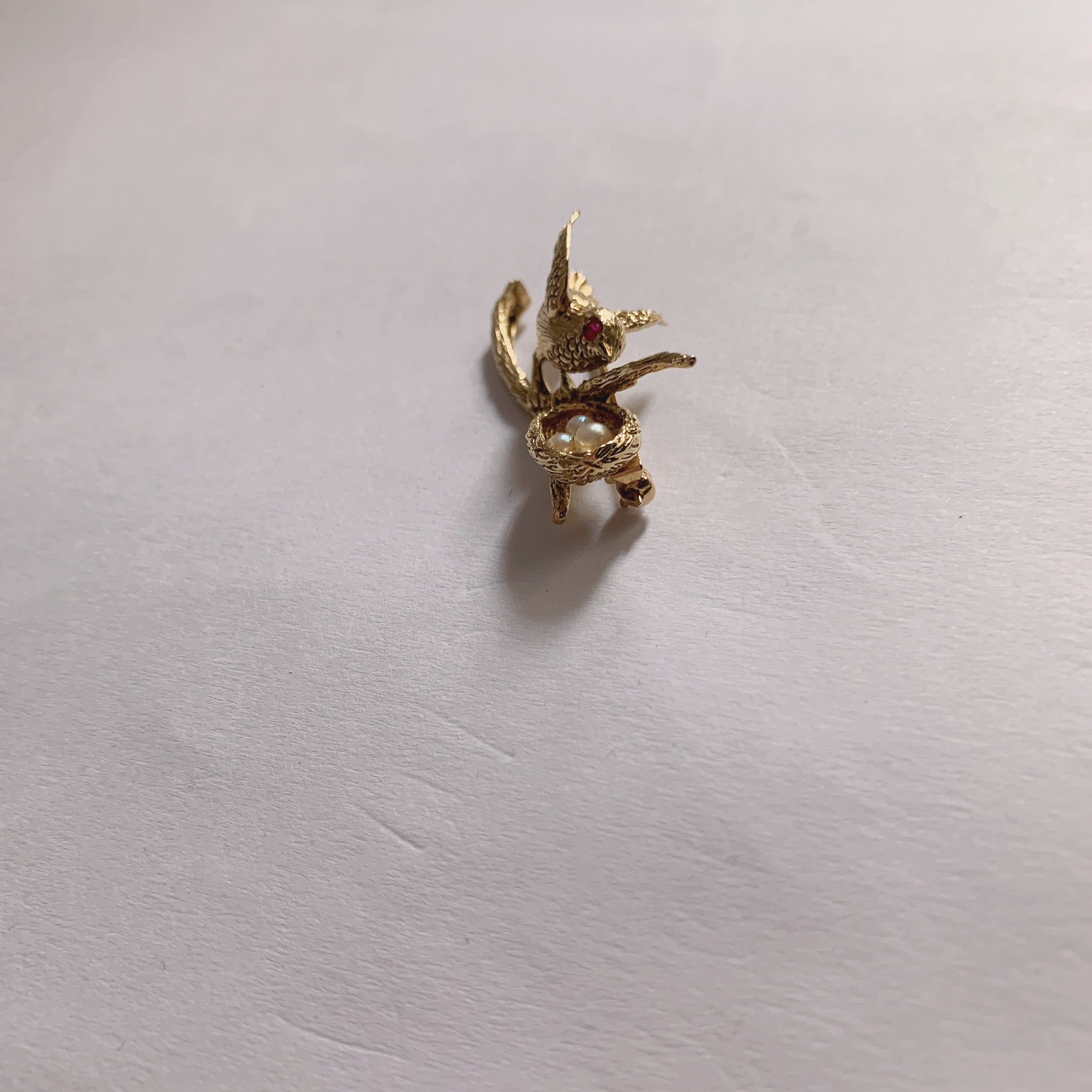 18K yellow gold bird and nest pin with pearls