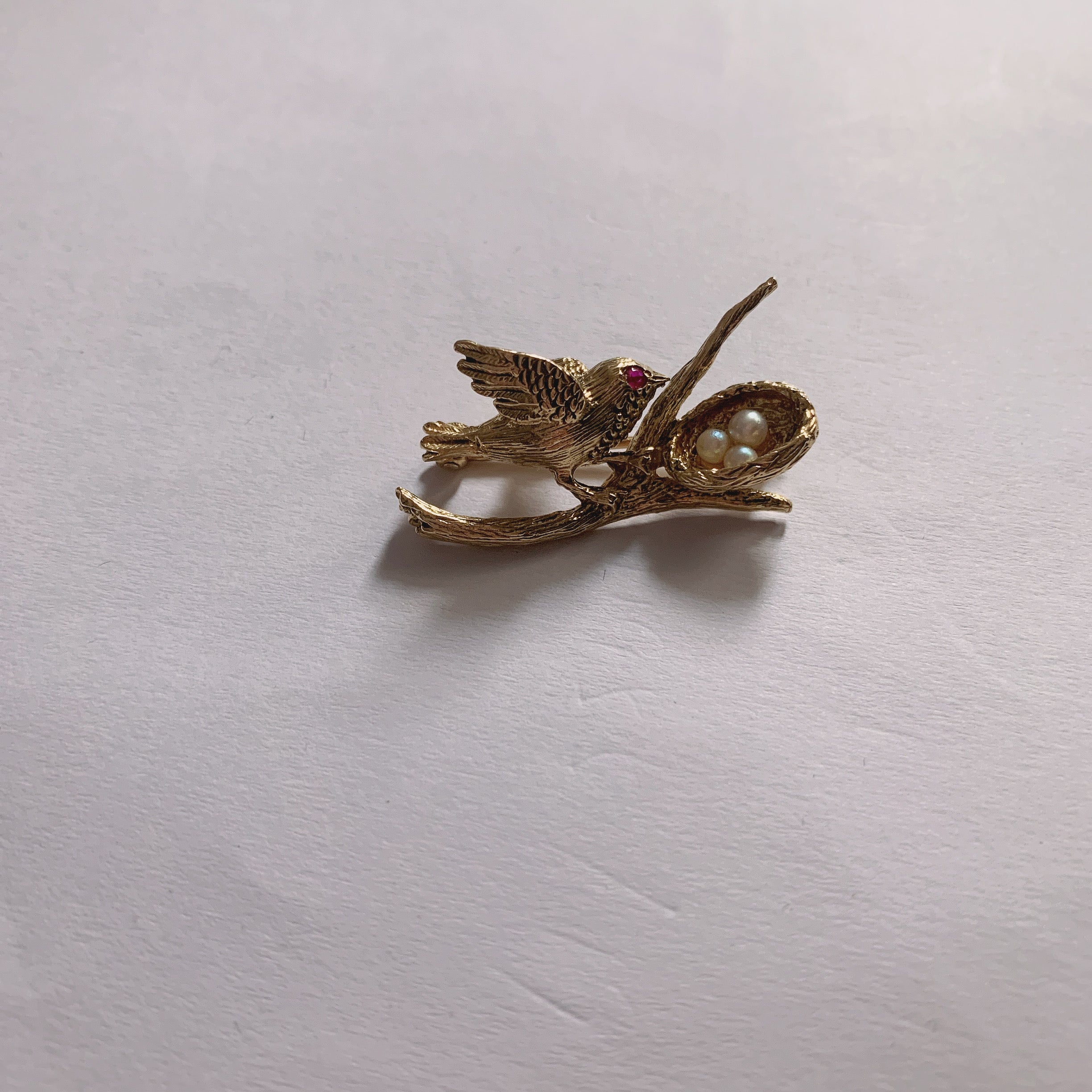 18K yellow gold bird and nest pin with pearls